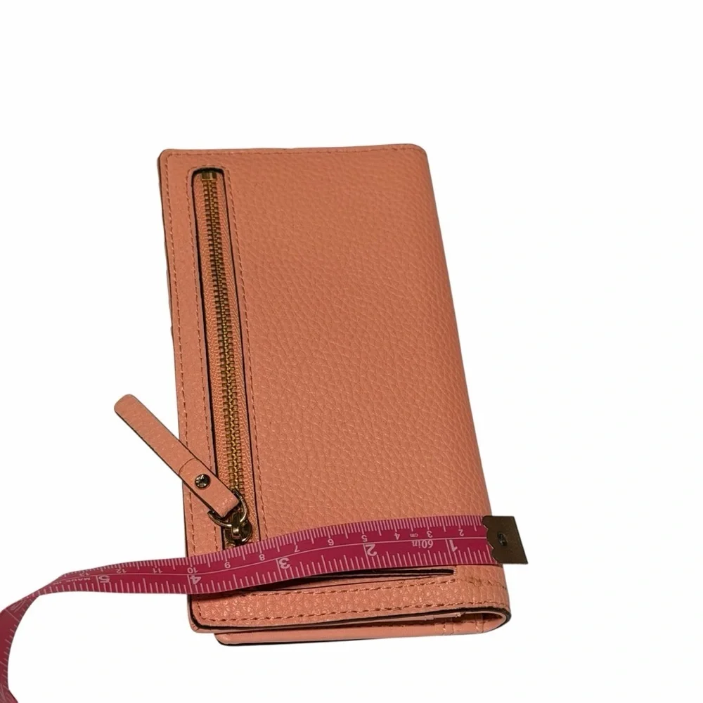 kate spade Pebbled Leather Bow Continental Wallet in Dusty Pink
